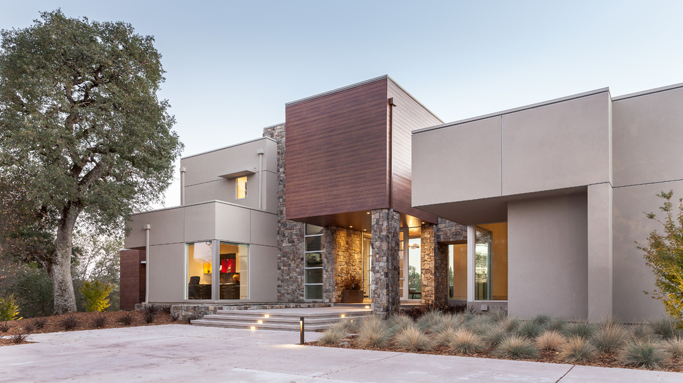 Large contemporary white two-story mixed siding exterior home idea in Sacramento