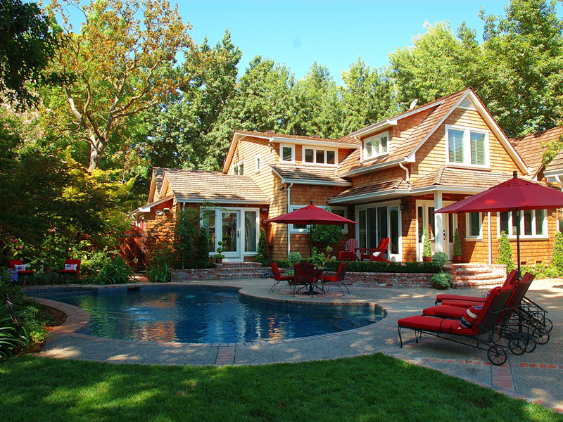 Inspiration for a transitional two-story wood exterior home remodel in Sacramento