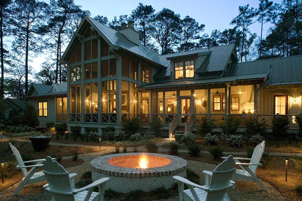 Island style wood exterior home photo in Charleston