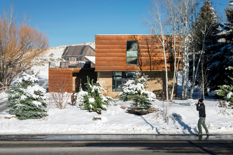 Inspiration for a large industrial two-story mixed siding exterior home remodel in Salt Lake City