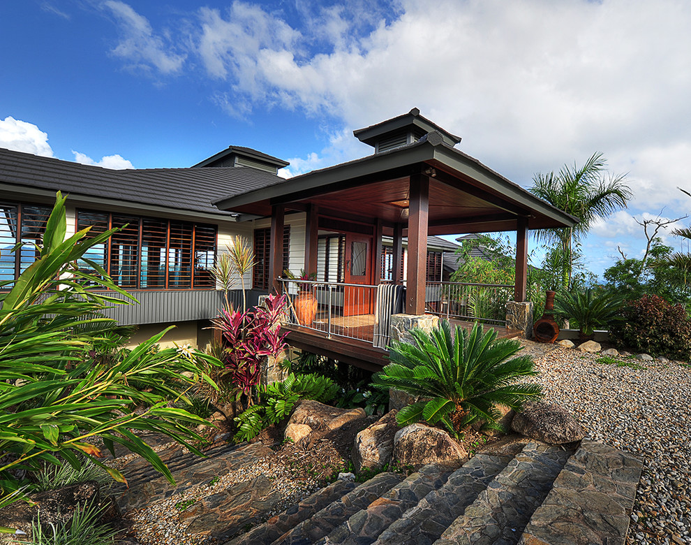 Inspiration for a world-inspired house exterior in Cairns.