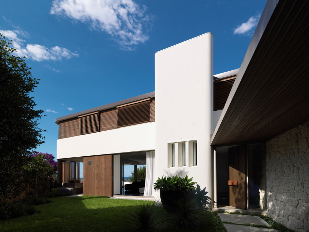 Свежая идея для дизайна: двухэтажный, деревянный дом в современном стиле с плоской крышей - отличное фото интерьера