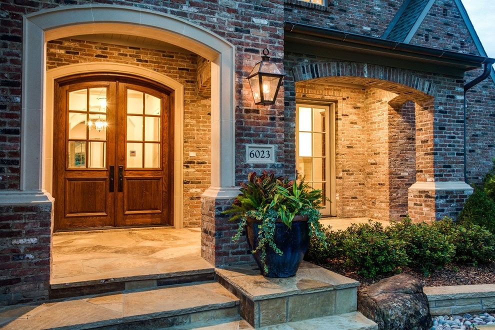 Inspiration for a large and red traditional two floor brick detached house in Dallas with a pitched roof and a shingle roof.