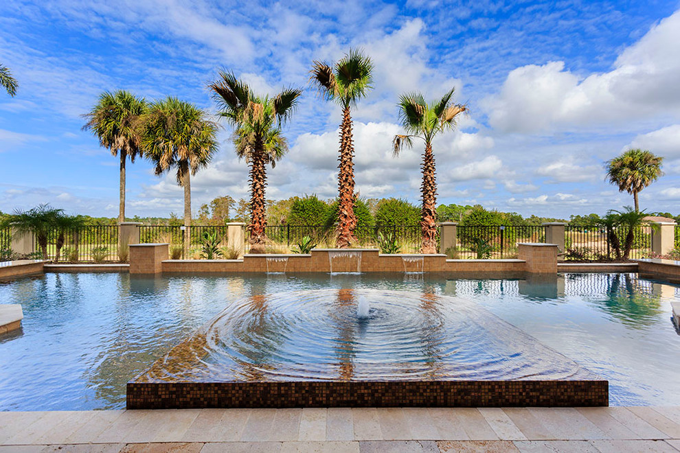 Example of a large island style pool design in Orlando
