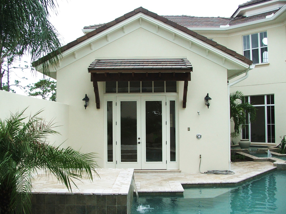 Inspiration for a mediterranean exterior home remodel in Orlando