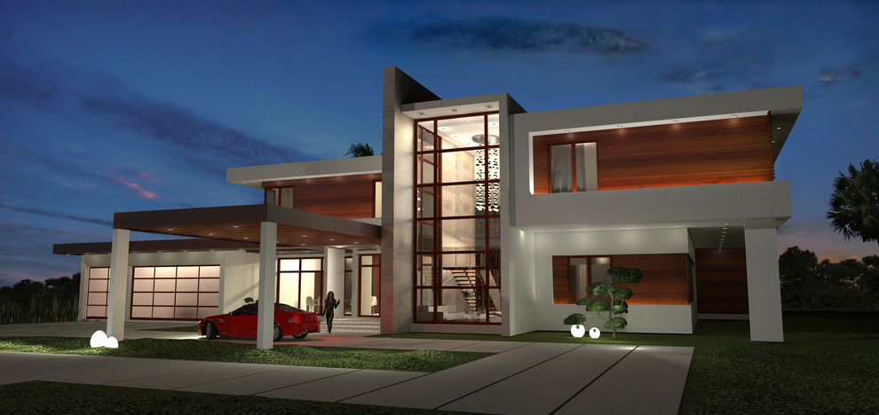Photo of a large and beige contemporary two floor house exterior in Miami with wood cladding.