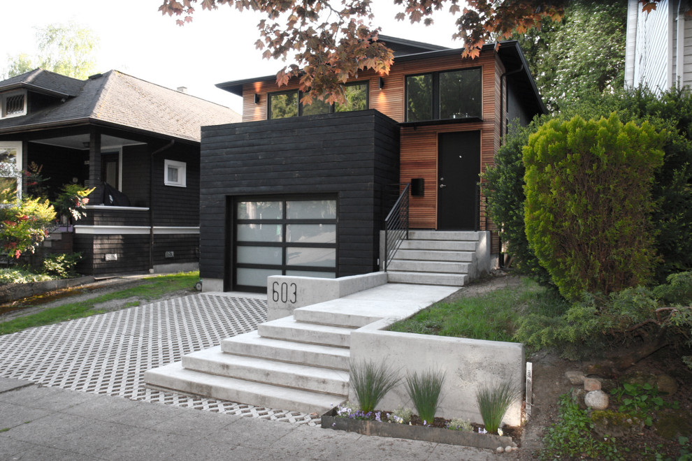 Small and multi-coloured modern two floor detached house in Seattle with wood cladding, a hip roof, a shingle roof and a grey roof.