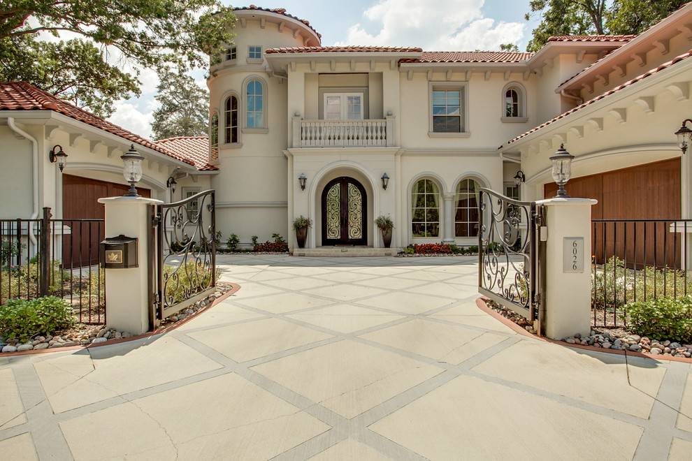 Beige mediterranean two floor house exterior in Dallas.