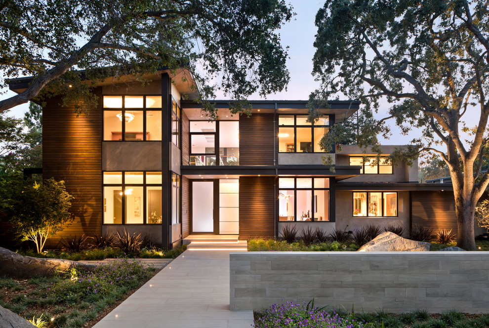 This is an example of a brown contemporary two floor detached house in San Francisco with mixed cladding and a flat roof.