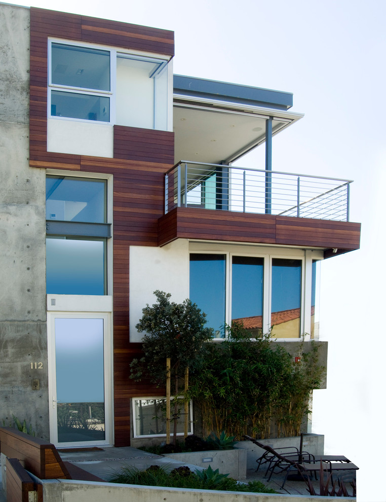 Источник вдохновения для домашнего уюта: большой, двухэтажный, разноцветный частный загородный дом в стиле модернизм с облицовкой из бетона и плоской крышей