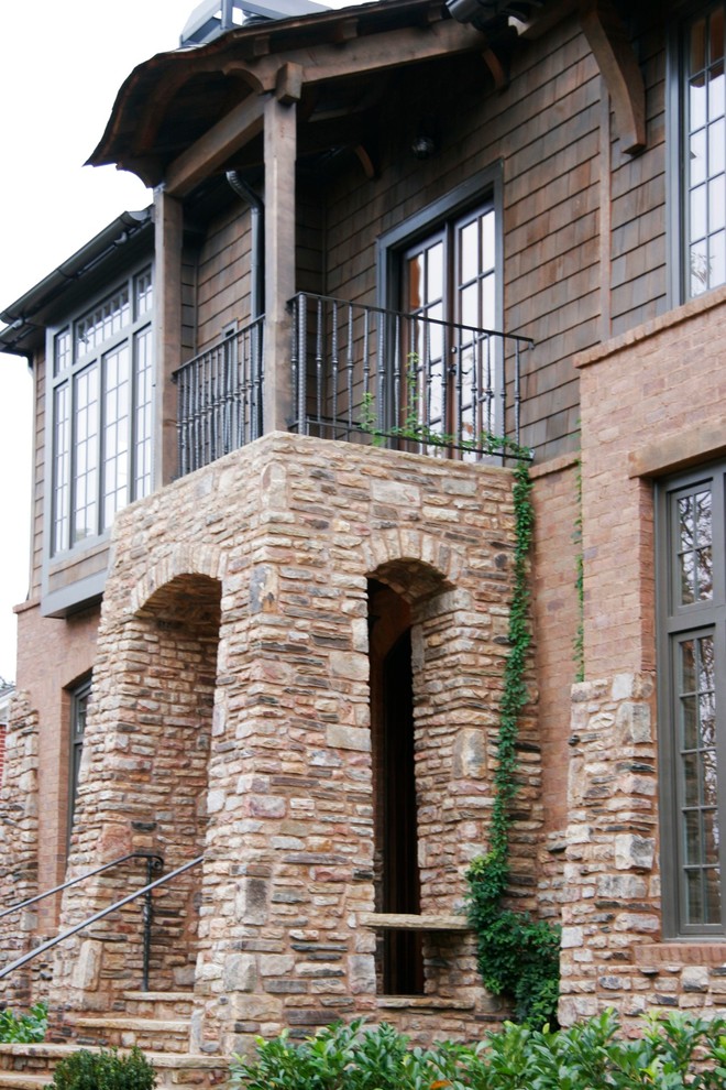 Design ideas for a rustic house exterior in Atlanta.