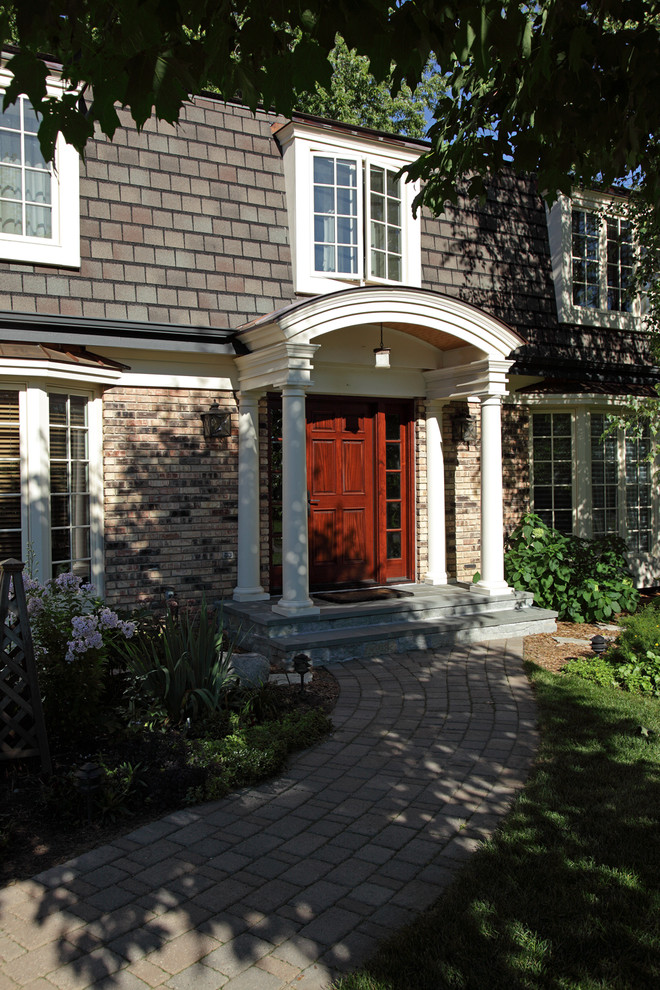 This is an example of a traditional brick house exterior in Minneapolis.