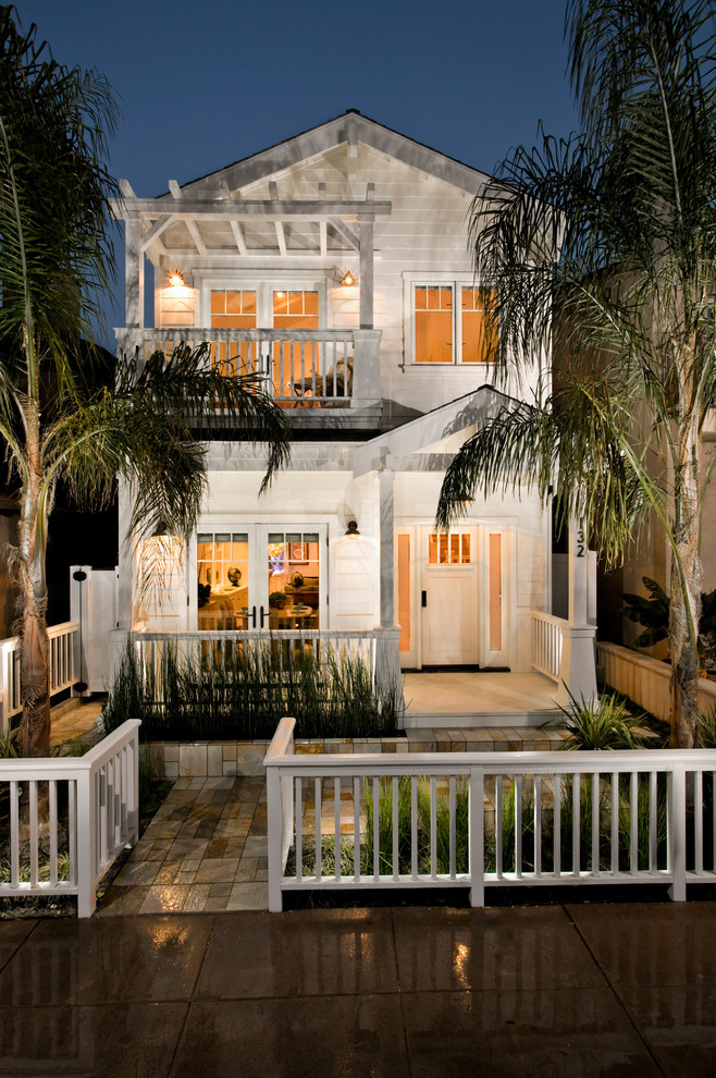 Inspiration for a coastal exterior home remodel in Orange County