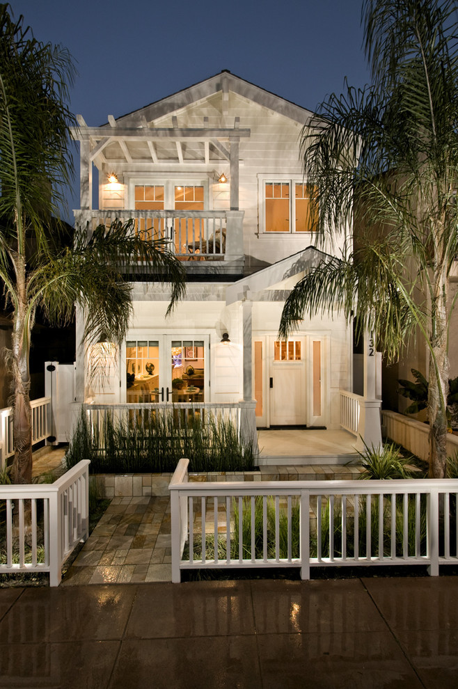 Inspiration for a tropical exterior home remodel in Orange County