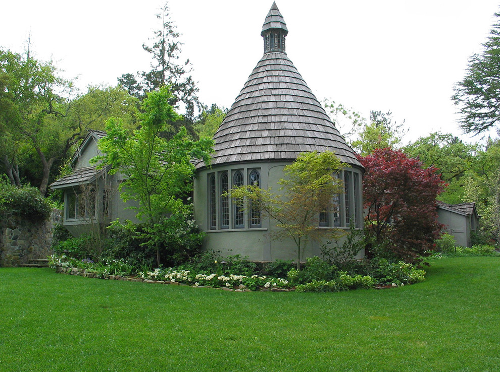 Ispirazione per la facciata di una casa ampia verde american style a due piani con rivestimento in stucco