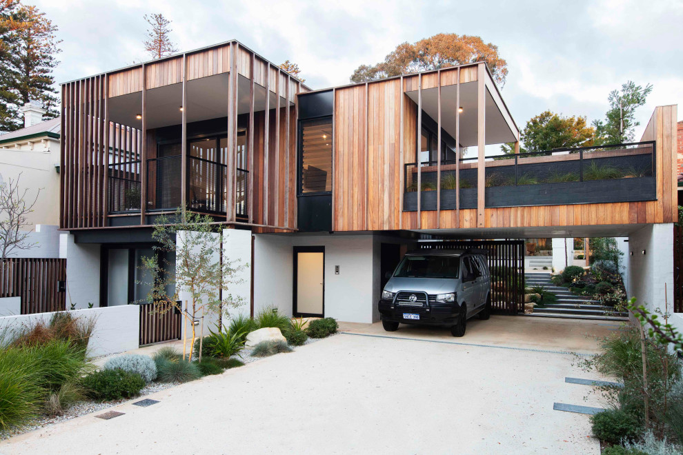 Zweistöckiges Industrial Einfamilienhaus mit bunter Fassadenfarbe und Flachdach in Perth
