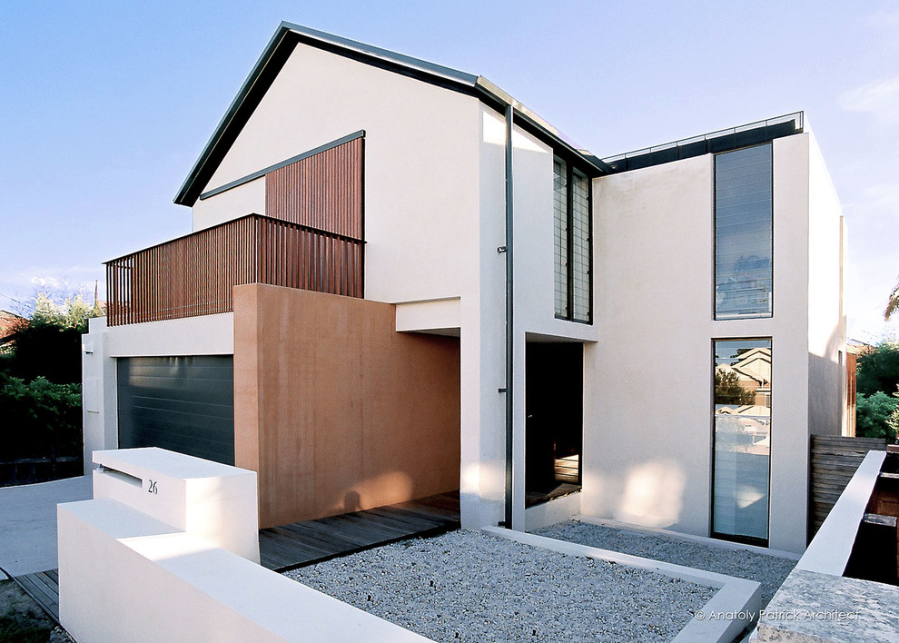 Großes, Zweistöckiges Modernes Einfamilienhaus mit Backsteinfassade, weißer Fassadenfarbe, Satteldach und Ziegeldach in Sydney