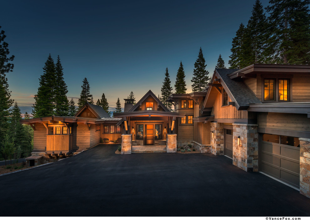 Example of a mountain style brown three-story wood exterior home design in Sacramento