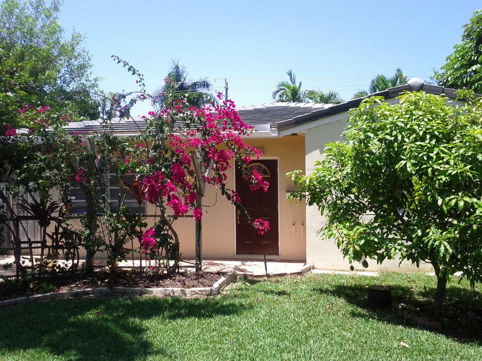 Island style exterior home photo in Miami