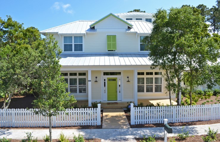 Mid-sized coastal white two-story vinyl exterior home idea in Jacksonville with a clipped gable roof
