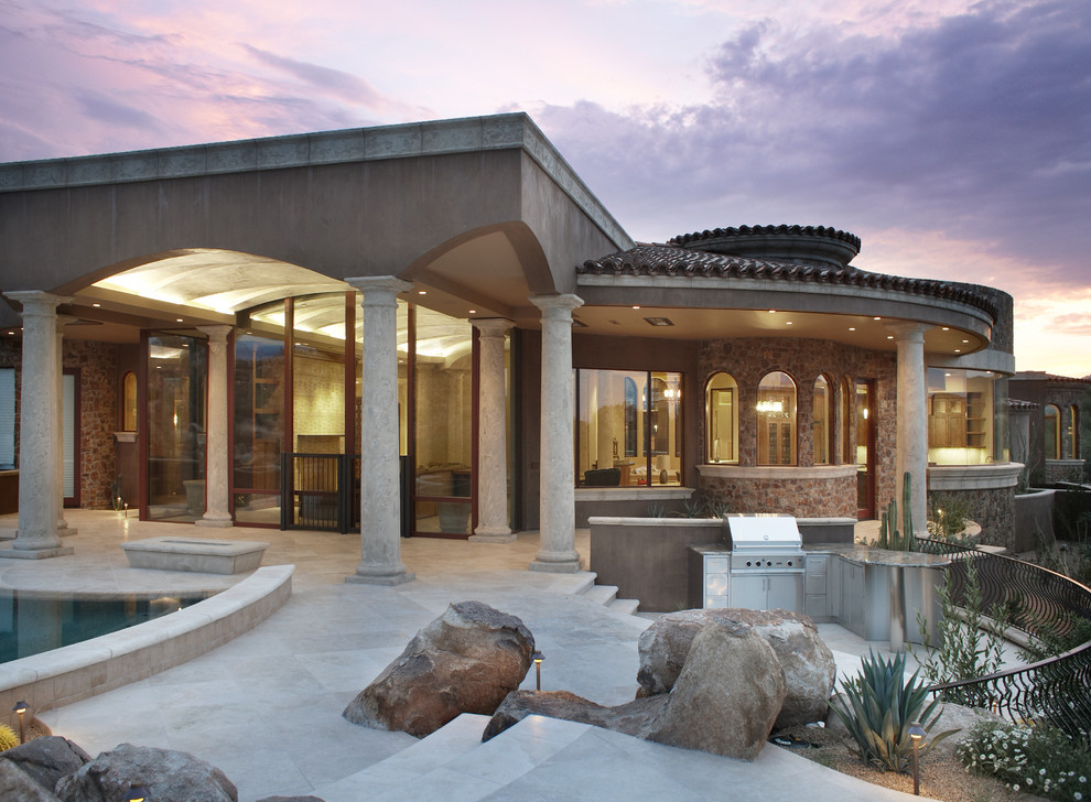 This is an example of a mediterranean house exterior in Phoenix.