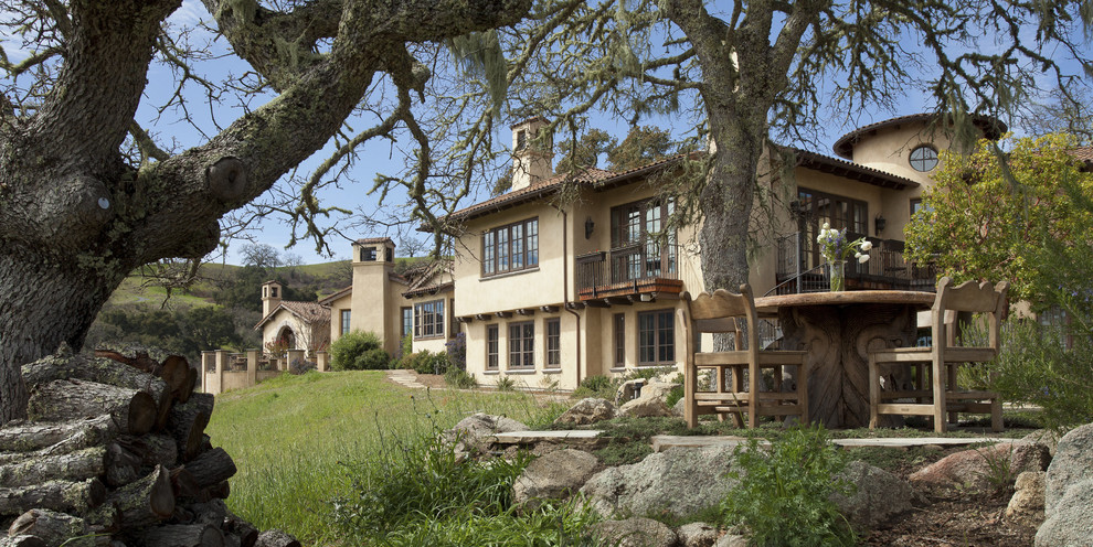 This is an example of a mediterranean two floor house exterior in San Francisco.