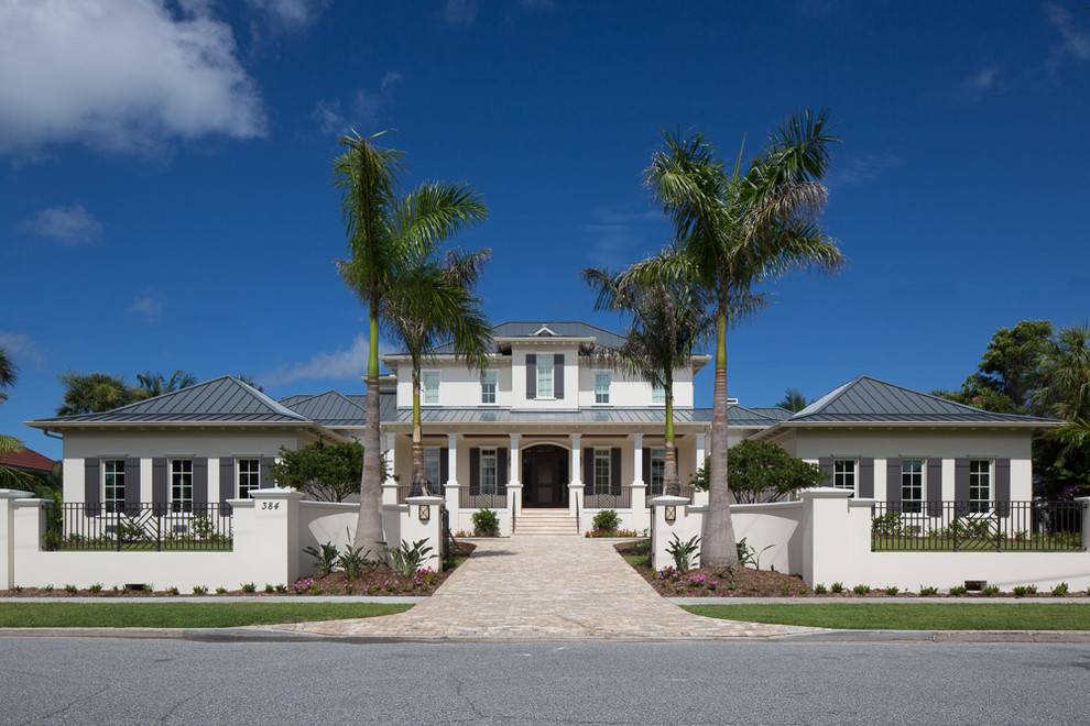 Tuscan white two-story exterior home photo in Tampa