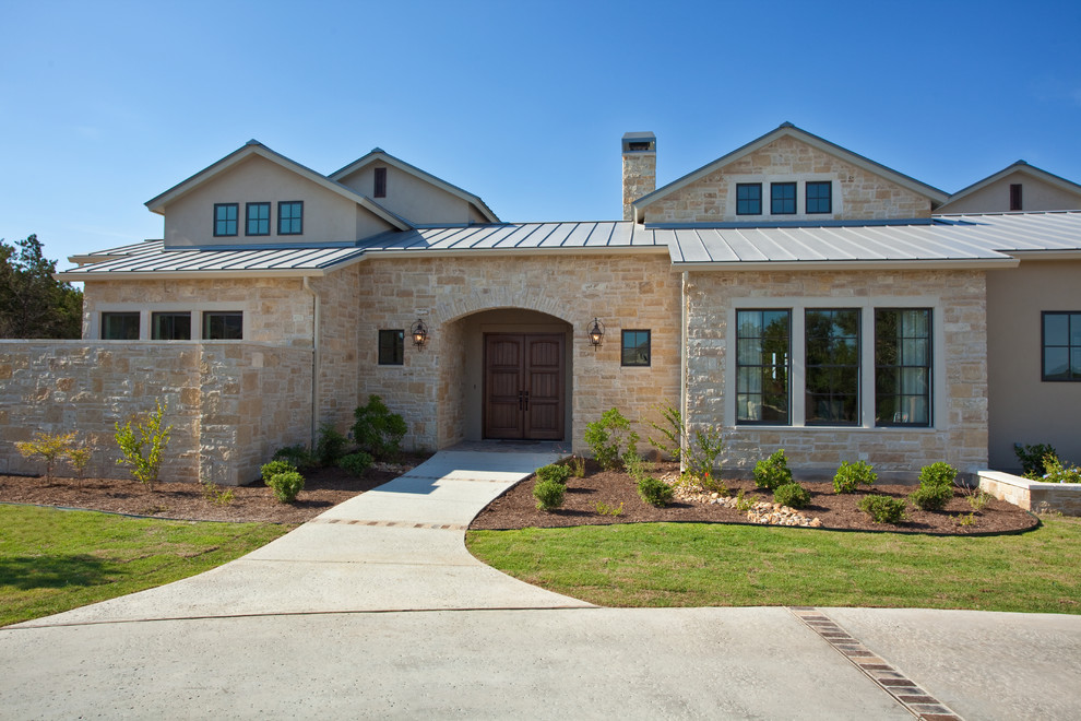 Traditional two-story exterior home idea in Austin