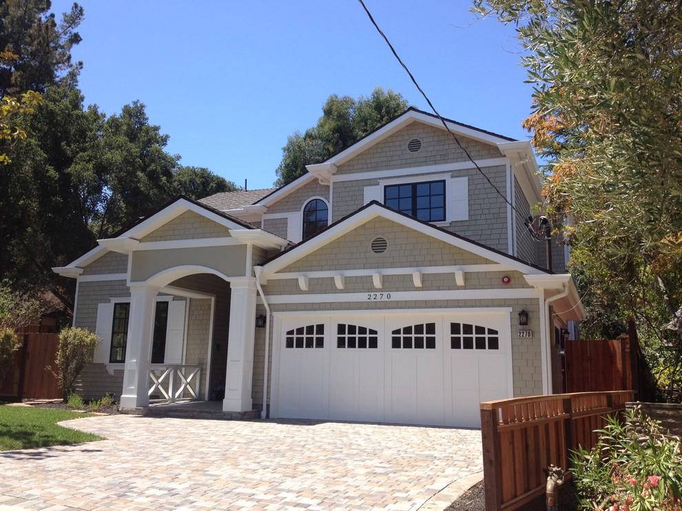 Large arts and crafts beige two-story wood gable roof photo in San Francisco