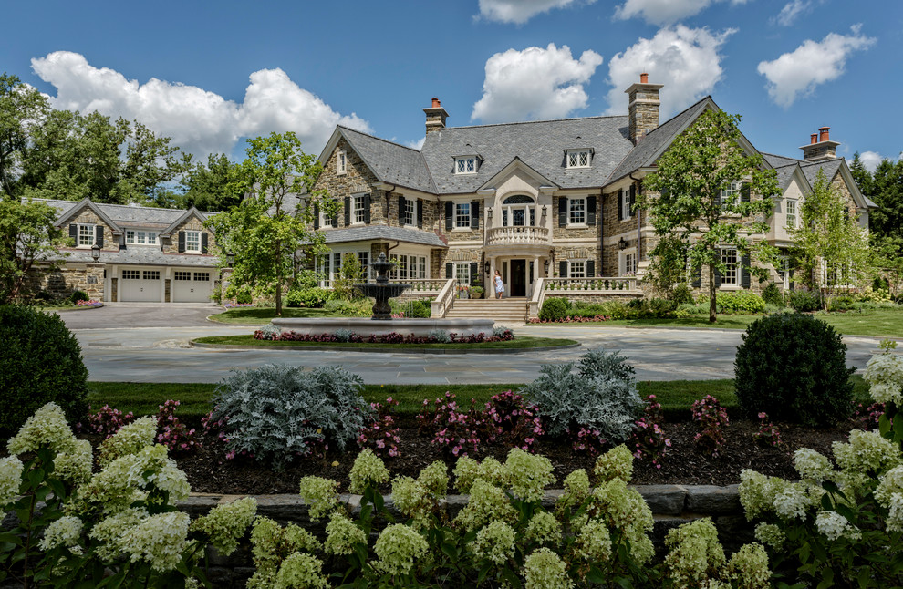 Huge elegant beige two-story stone house exterior photo in Philadelphia