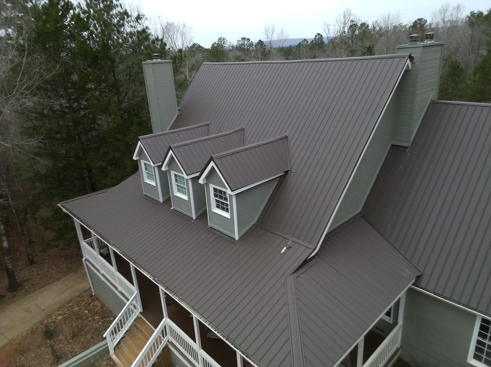 Inspiration for a large timeless green two-story wood exterior home remodel in Atlanta with a shingle roof