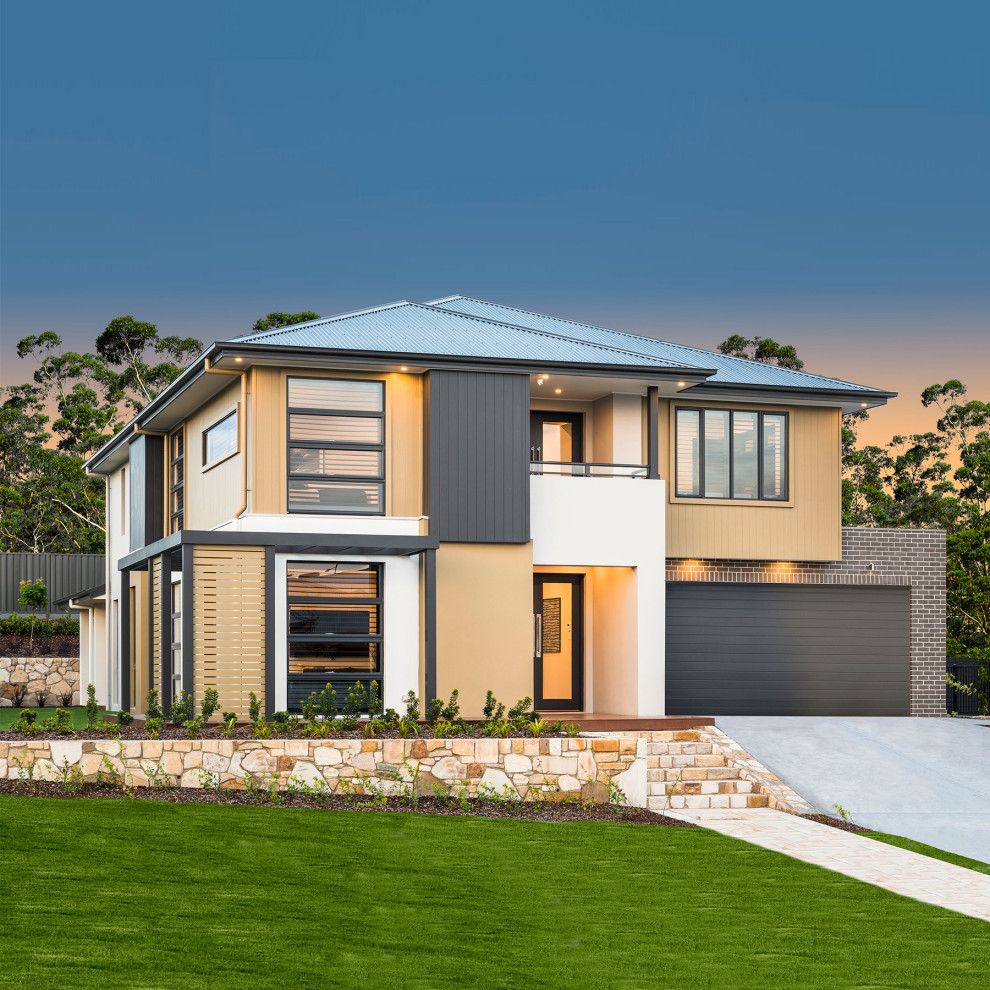 Großes, Zweistöckiges Industrial Einfamilienhaus mit Betonfassade, weißer Fassadenfarbe, Satteldach und Blechdach in Canberra - Queanbeyan