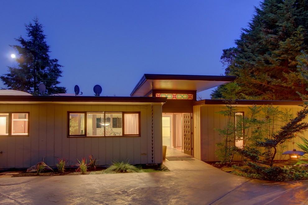 1960s two-story wood exterior home photo in Seattle