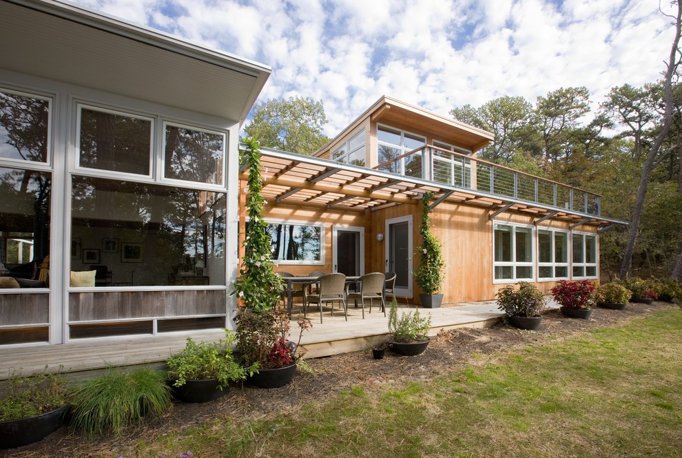 Inspiration for a 1960s two-story exterior home remodel in Boston