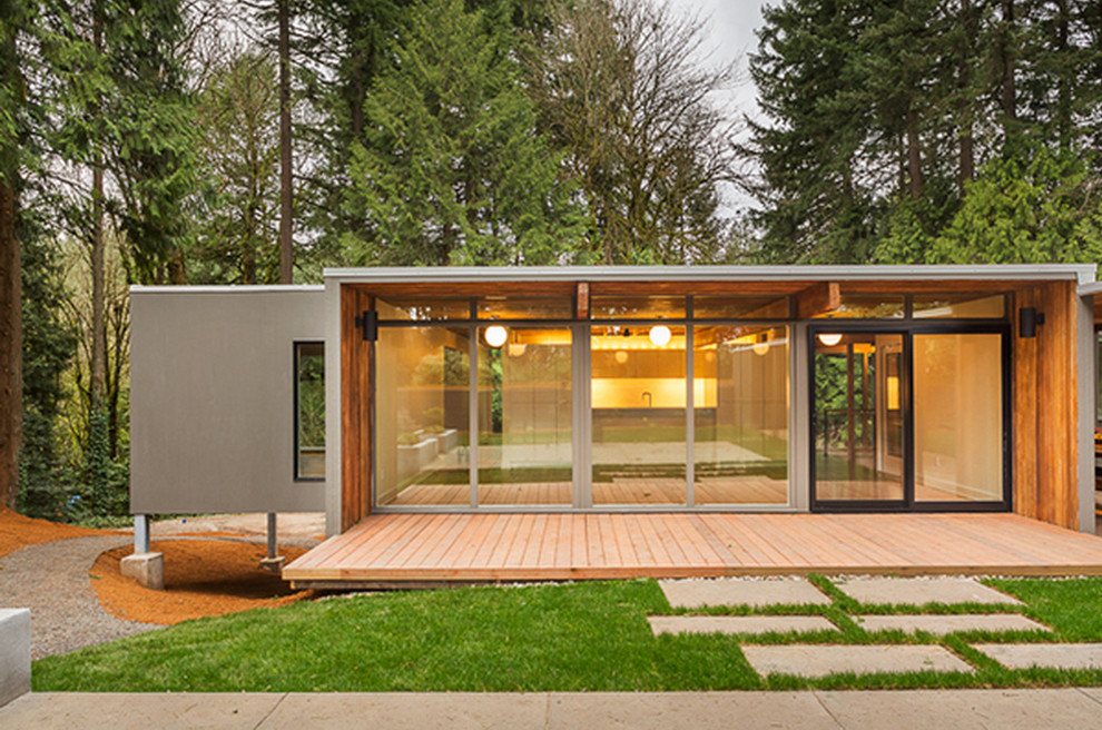 Mid-sized 1960s gray two-story concrete exterior home photo in Portland