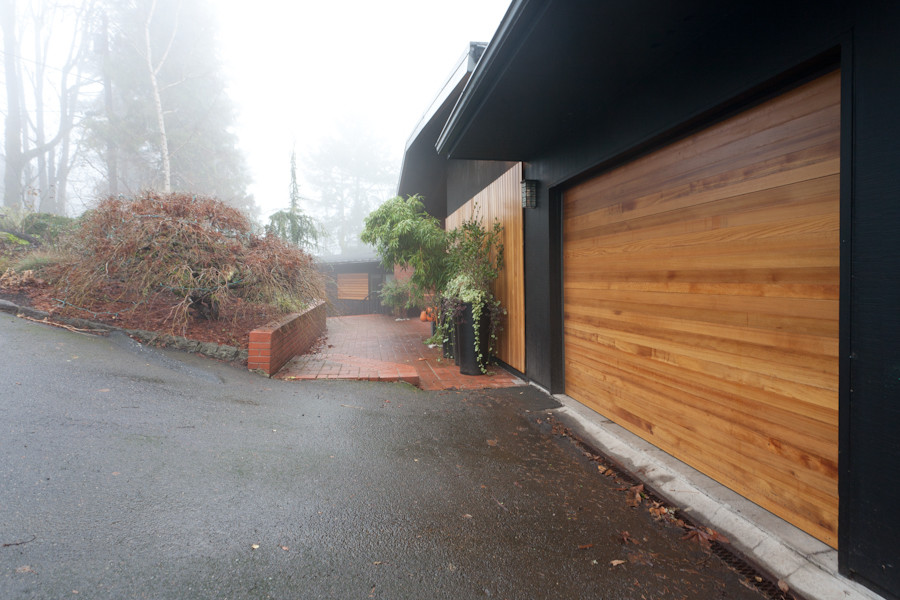 Photo of a black midcentury house exterior in Portland.