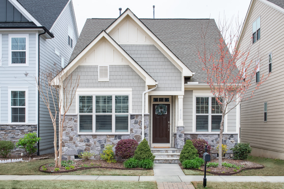 Inspiration for a medium sized and gey traditional two floor detached house in Raleigh with mixed cladding, a shingle roof and a pitched roof.