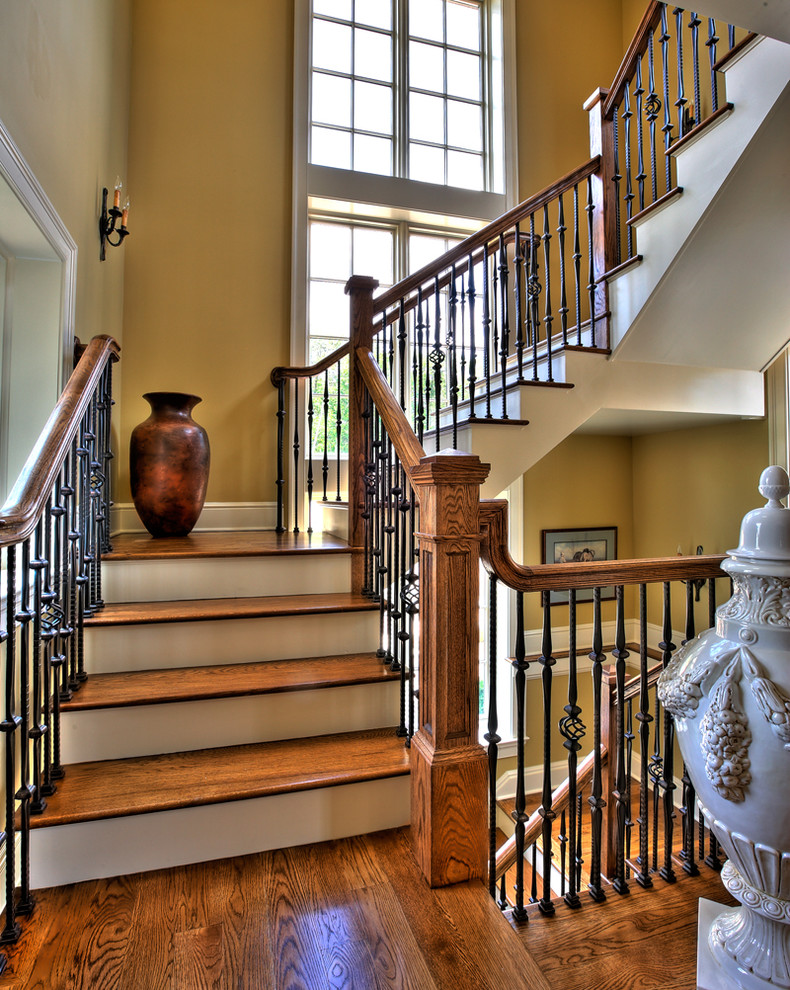 Example of a large classic staircase design in New York