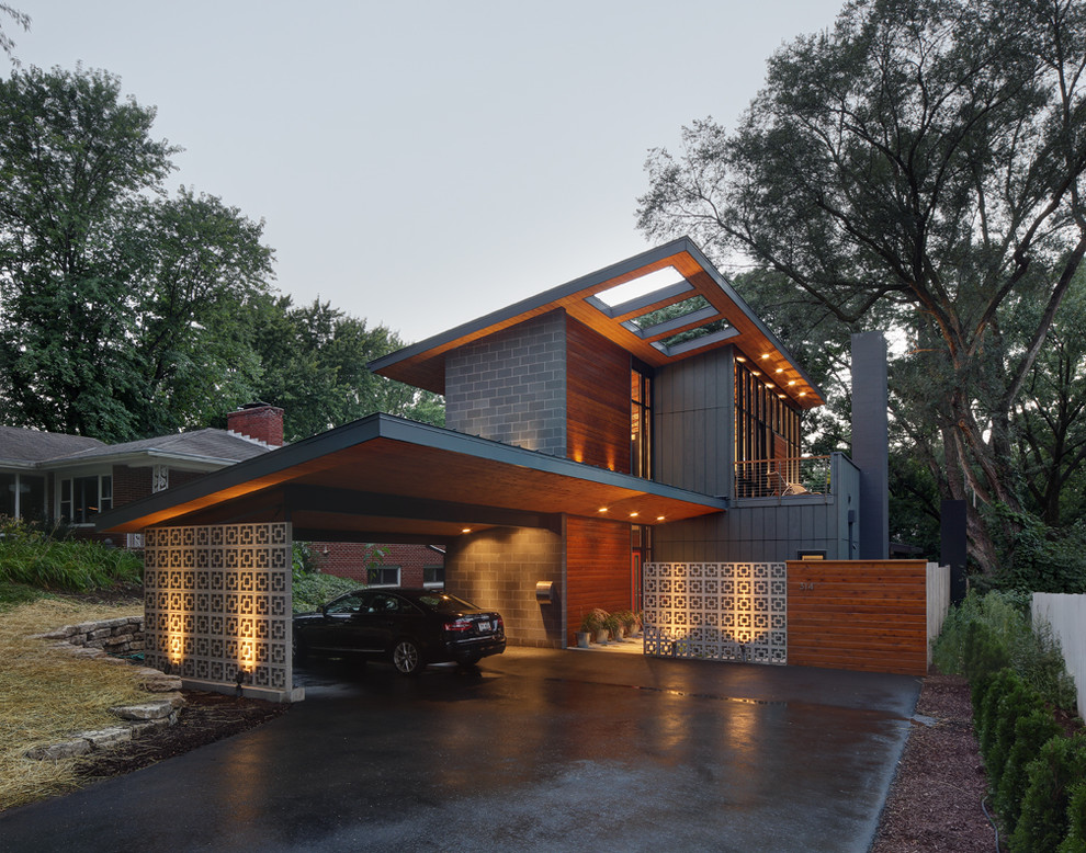 Источник вдохновения для домашнего уюта: двухэтажный, серый частный загородный дом среднего размера в современном стиле с односкатной крышей и комбинированной облицовкой