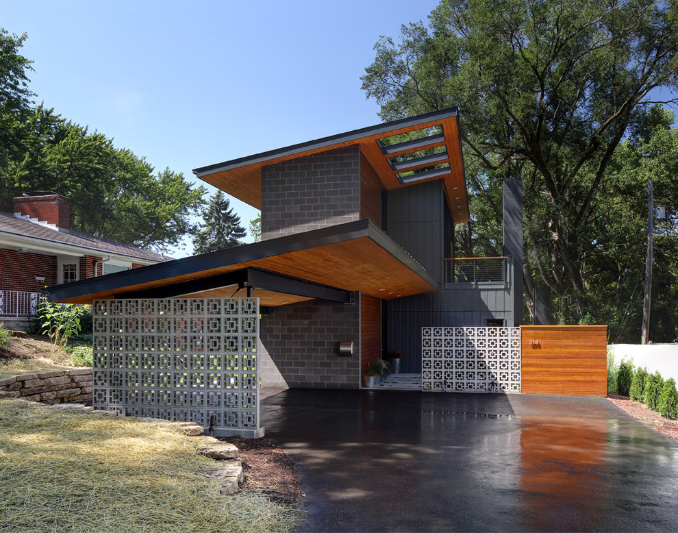 Inspiration för moderna grå hus, med två våningar och blandad fasad