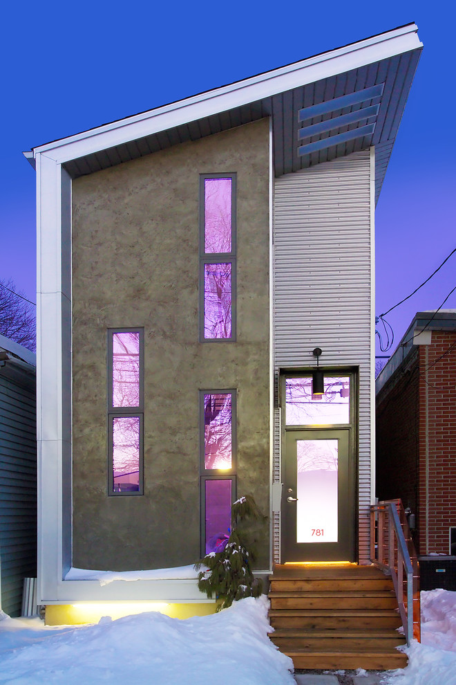 Cette photo montre une petite façade de maison tendance à un étage avec un toit en appentis.