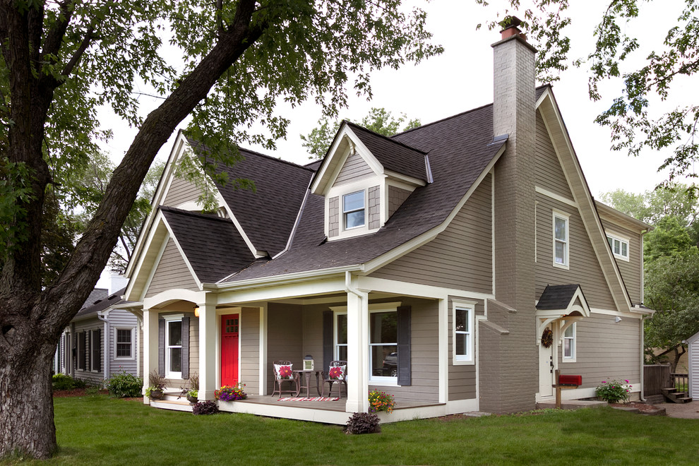 Example of a mid-sized classic brown exterior home design in Minneapolis