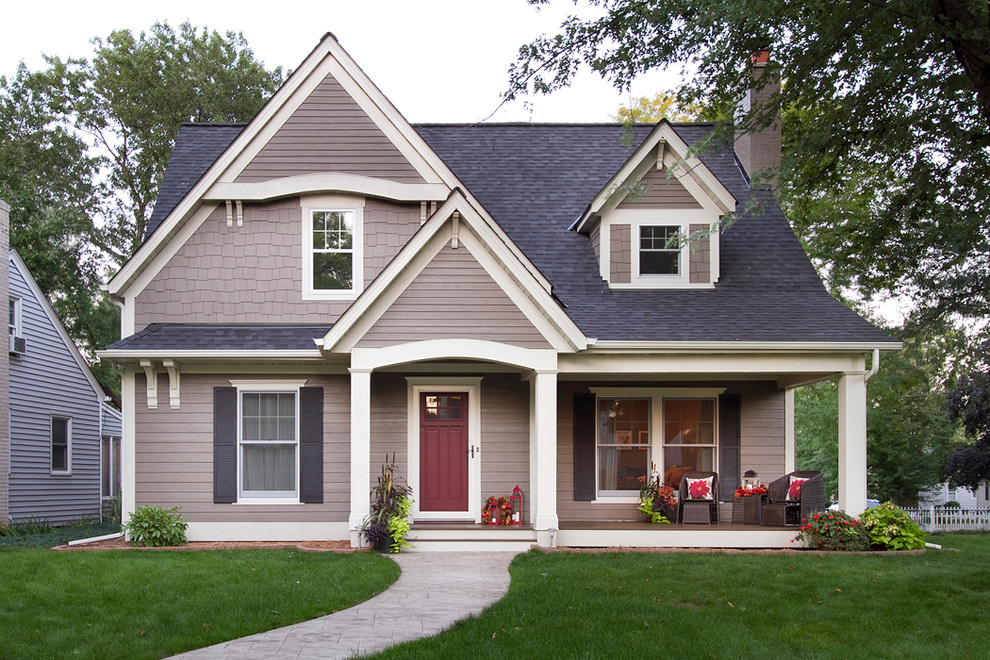 Inspiration for a timeless gray two-story exterior home remodel in Minneapolis