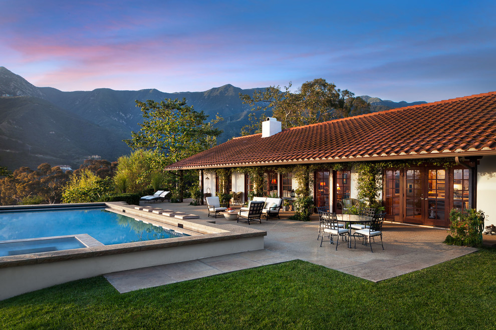 This is an example of a mediterranean bungalow house exterior in Santa Barbara.