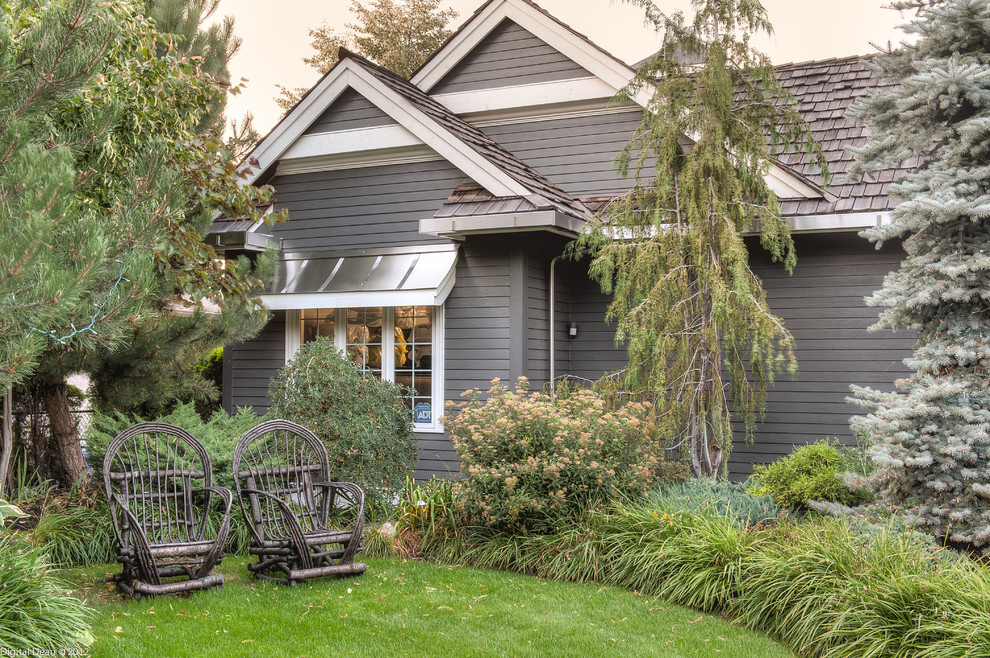 Example of a classic brown exterior home design in Vancouver