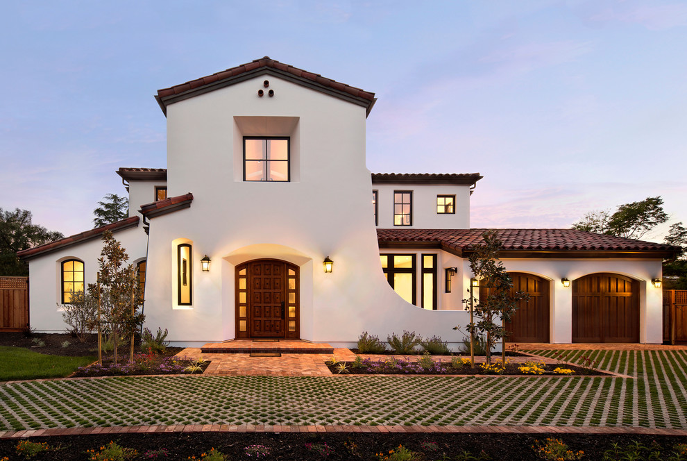 Inspiration for a mediterranean white two-story exterior home remodel in San Francisco