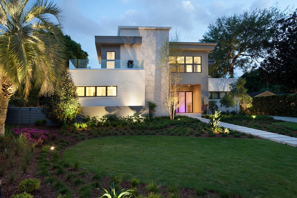 Inspiration for a contemporary two-story exterior home remodel in Orlando
