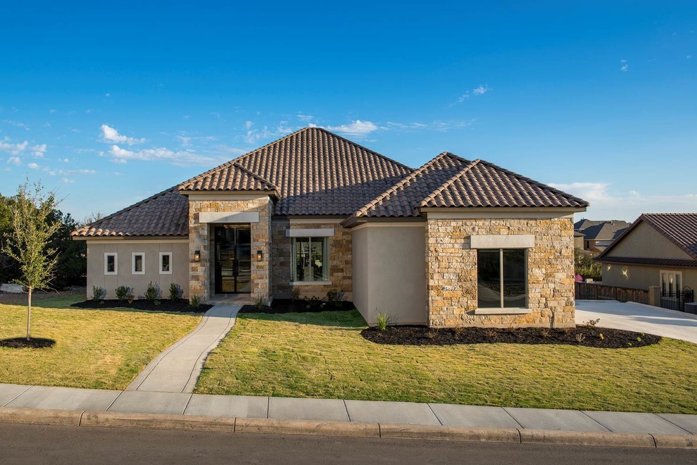 Example of a transitional exterior home design in Austin