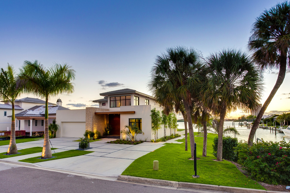 Design ideas for a world-inspired house exterior in Tampa.