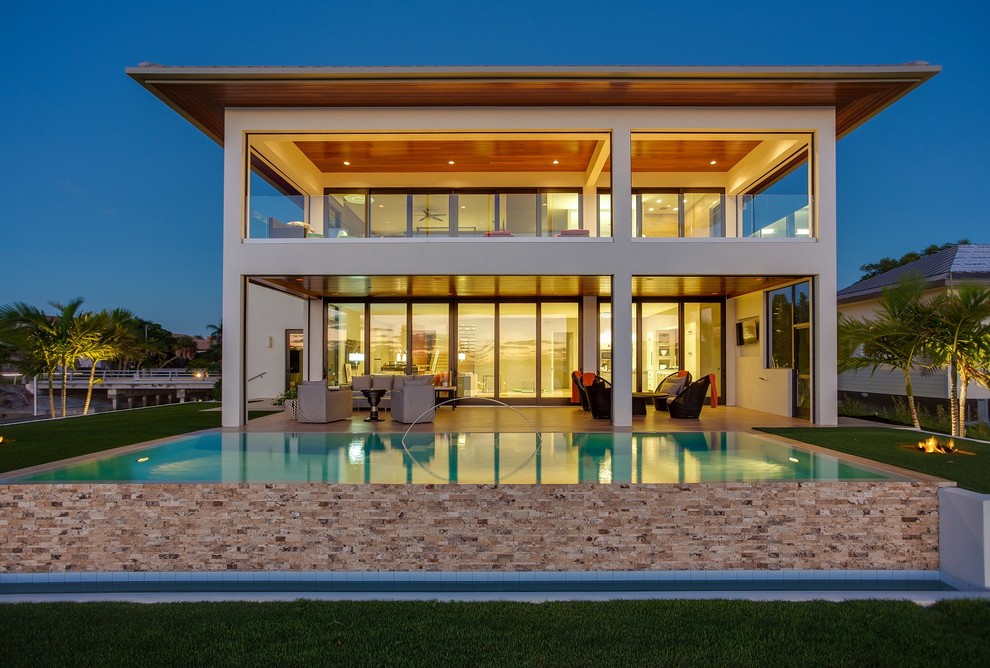 Inspiration for a world-inspired house exterior in Tampa.